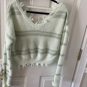 women’s V-neck sweater, fringe at neck and waist, light Tiffany blue